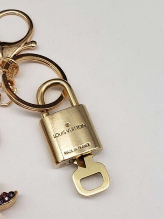 Louis Vuitton Lock and Key Set- Authentic Brass Padlock  Authentic Louis Vuitton Padlock & Key Gold ✨Unbranded Swan Bag Charm Keychain